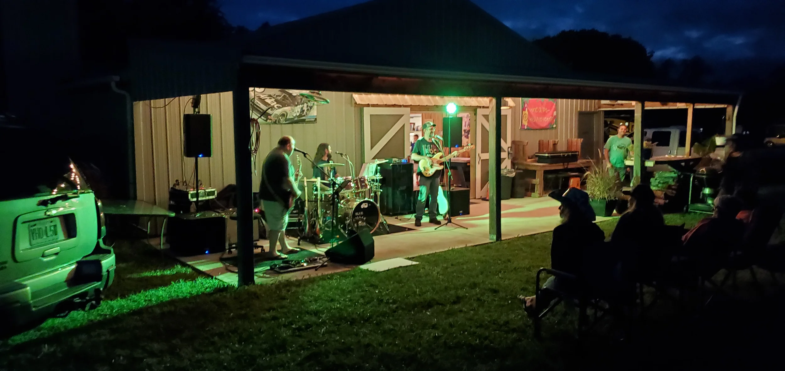 The Blue Collar Kings playing music at the Sidetrack RV Park barn