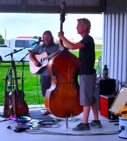 eric howell playing porch music behind the barn at sidetrack rv park